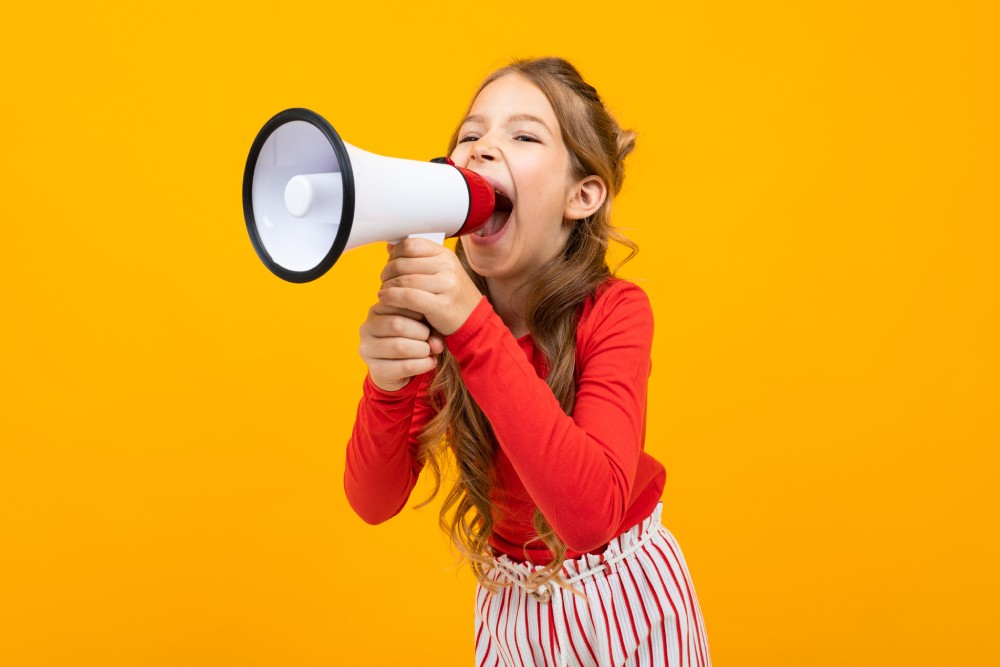 Girl talking through a megaphone